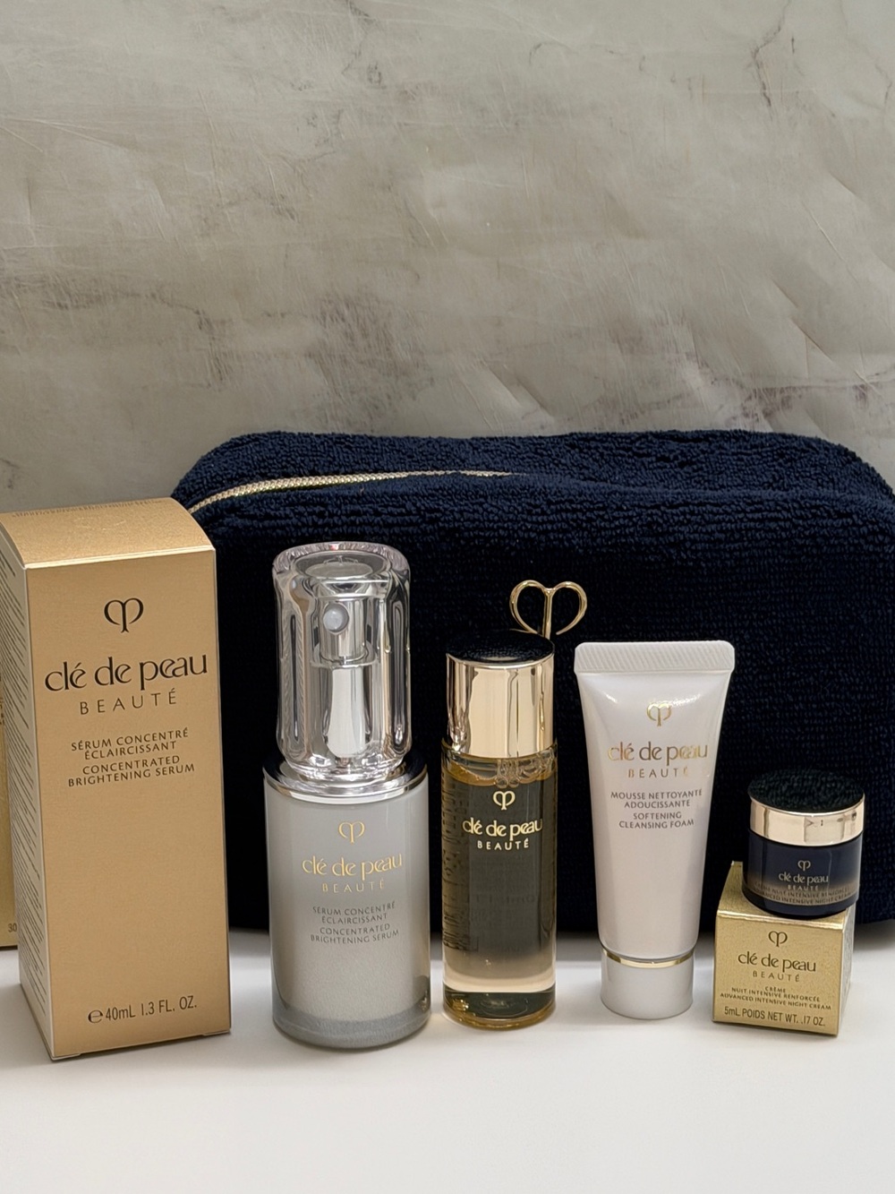 Cle de Peau CONCENTRATED BRIGHTENING SERUM plus travel size products and bag - Picture 6 of 12